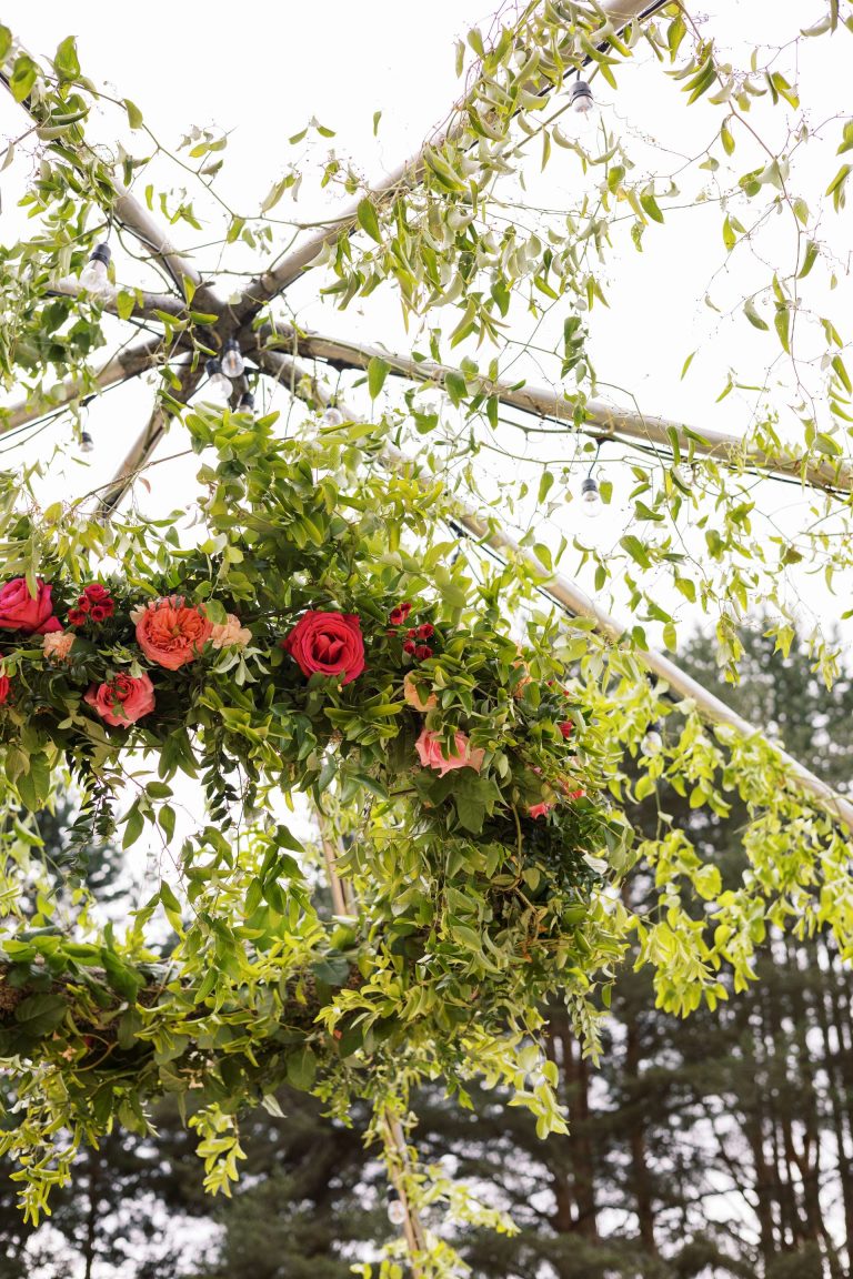 Puyallup garden wedding with beautiful floral chandelier and dance floor design.