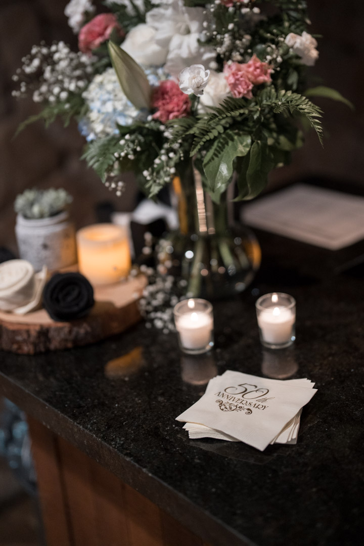 Elegant fireside decor for a 50th wedding anniversary party in Puyallup.