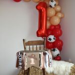 First Rodeo highchair birthday red and cow print design with cake and cowboy boy