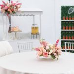 Tacoma birthday party graduation party event design by Olivia Sloan Events with cheers drink wall and custom white cart and florals
